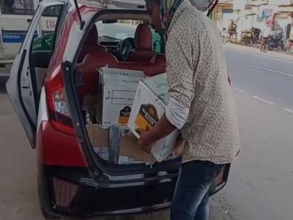 One detained for illegally transporting 514 liquor bottles in Andhra | One detained for illegally transporting 514 liquor bottles in Andhra