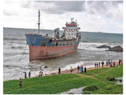 Bangladeshi cargo ship runs aground near Vishakhapatnam due to rough seas, harsh weather | Bangladeshi cargo ship runs aground near Vishakhapatnam due to rough seas, harsh weather