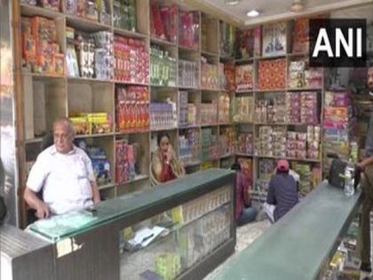 COVID-19 impact: As firecracker sales nosedive, wholesalers suffer in Gujarat | COVID-19 impact: As firecracker sales nosedive, wholesalers suffer in Gujarat COVID-19 impact: As firecracker sales nosedive, wholesalers suffer in Gujarat | COVID-19 impact: As firecracker sales nosedive, wholesalers suffer in Gujarat