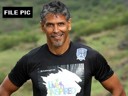 Milind Soman booked for circulating his 'obscene' picture | Milind Soman booked for circulating his 'obscene' picture