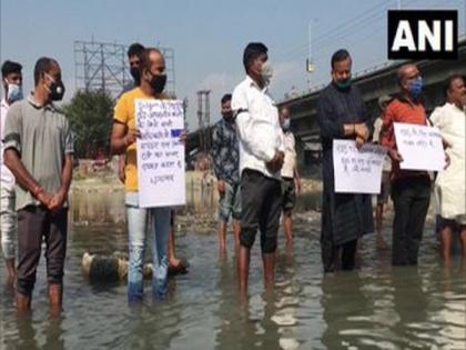 Locals hold protest in Siliguri over lack of provision of space for Chhath Puja celebrations | Locals hold protest in Siliguri over lack of provision of space for Chhath Puja celebrations Locals hold protest in Siliguri over lack of provision of space for Chhath Puja celebrations | Locals hold protest in Siliguri over lack of provision of space for Chhath Puja celebrations