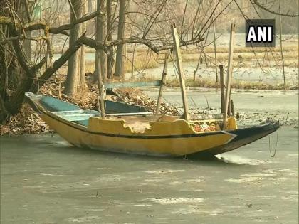 Frozen Dal Lake a memorable sight for locals, tourists | Frozen Dal Lake a memorable sight for locals, tourists Frozen Dal Lake a memorable sight for locals, tourists | Frozen Dal Lake a memorable sight for locals, tourists