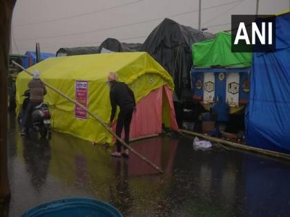 Farmers' protest continues despite rain, cold wave | Farmers' protest continues despite rain, cold wave Farmers' protest continues despite rain, cold wave | Farmers' protest continues despite rain, cold wave