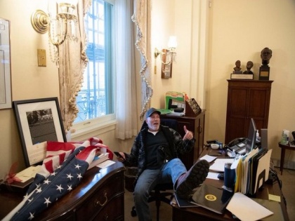Man photographed sitting with foot up on Speaker Nancy Pelosi 's desk at Capitol arrested | Man photographed sitting with foot up on Speaker Nancy Pelosi 's desk at Capitol arrested
