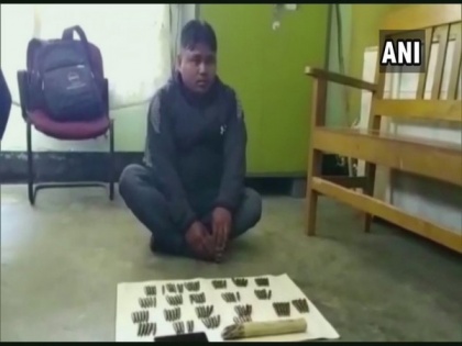 Man held with elephant tusk, live bullets in Assam | Man held with elephant tusk, live bullets in Assam