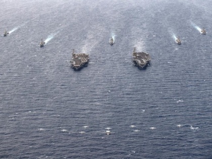 Two US carrier groups conduct exercises in South China Sea, Beijing threatens action | Two US carrier groups conduct exercises in South China Sea, Beijing threatens action