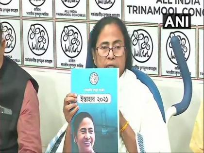 Mamata Banerjee releases TMC poll manifesto | Mamata Banerjee releases TMC poll manifesto