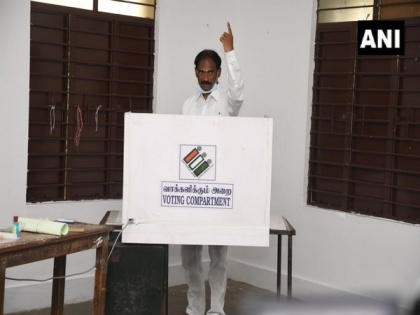 Saminathan, Rangaswamy cast votes as polling begins in Puducherry | Saminathan, Rangaswamy cast votes as polling begins in Puducherry