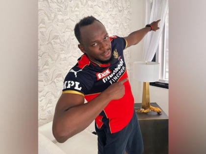 Bolt in RCB jersey cheers for the team ahead of IPL | Bolt in RCB jersey cheers for the team ahead of IPL