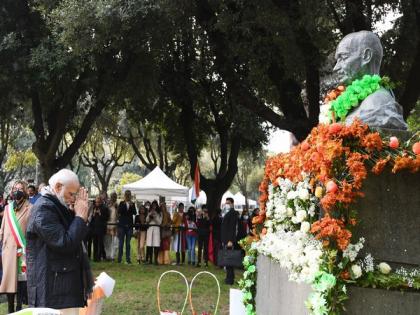 PM Modi pays floral tribute to Mahatma Gandhi at Piazza Gandhi in Rome | PM Modi pays floral tribute to Mahatma Gandhi at Piazza Gandhi in Rome