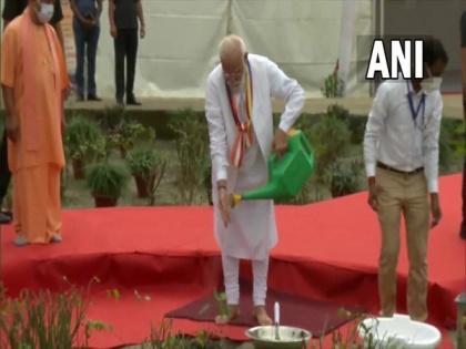 Abhidhamma Day: PM Modi plants sapling in UP's Kushinagar | Abhidhamma Day: PM Modi plants sapling in UP's Kushinagar