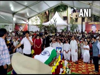 Karnataka CM pays his last respects to actor Puneeth Rajkumar | Karnataka CM pays his last respects to actor Puneeth Rajkumar