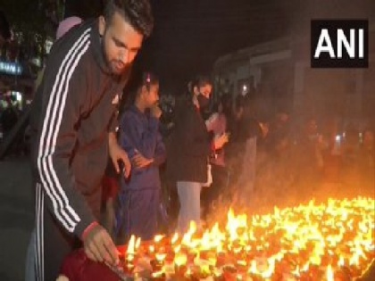 J-K: People light diyas in memory of martyrs in Udhampur | J-K: People light diyas in memory of martyrs in Udhampur