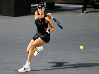 WTA Finals: Garbine Muguruza reaches semis after win over Anett Kontaveit | WTA Finals: Garbine Muguruza reaches semis after win over Anett Kontaveit