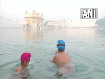 Amritsar: Devotees throng Golden Temple on Guru Nanak Jayanti | Amritsar: Devotees throng Golden Temple on Guru Nanak Jayanti