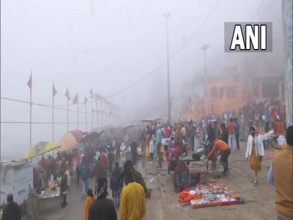 Defying severe cold wave, devotees gather for holy dip in River Ganga at Varanasi | Defying severe cold wave, devotees gather for holy dip in River Ganga at Varanasi