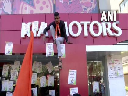 Bajrang Dal stages protest at KFC, Dominos, Pizza Hut joints, Hyundai, Kia Motors showrooms in Ahmedabad | Bajrang Dal stages protest at KFC, Dominos, Pizza Hut joints, Hyundai, Kia Motors showrooms in Ahmedabad