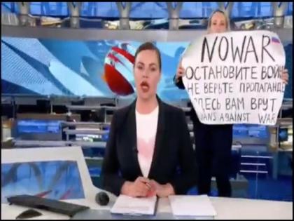 Russian Journalist who protested war on-air detained: Report | Russian Journalist who protested war on-air detained: Report