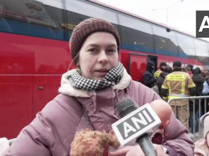 'Hope peace returns to my country', says Ukrainian woman after crossing Poland border | 'Hope peace returns to my country', says Ukrainian woman after crossing Poland border