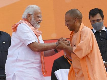 PM Modi greets CM Yogi Adityanath, UP ministers on taking oath | PM Modi greets CM Yogi Adityanath, UP ministers on taking oath