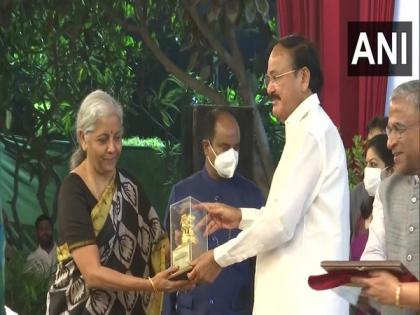 Venkaiah Naidu presents mementoes to retiring Rajya Sabha MPs Nirmala Sitharaman, Piyush Goyal | Venkaiah Naidu presents mementoes to retiring Rajya Sabha MPs Nirmala Sitharaman, Piyush Goyal