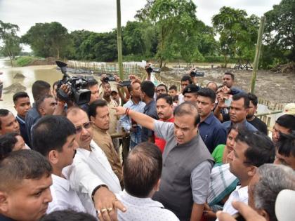 Assam: CM visits Darrang, inspects breached LB embankment | Assam: CM visits Darrang, inspects breached LB embankment