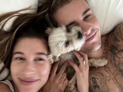 Justin Beiber shares sweet photo in bed with wife Hailey and pet dog | Justin Beiber shares sweet photo in bed with wife Hailey and pet dog