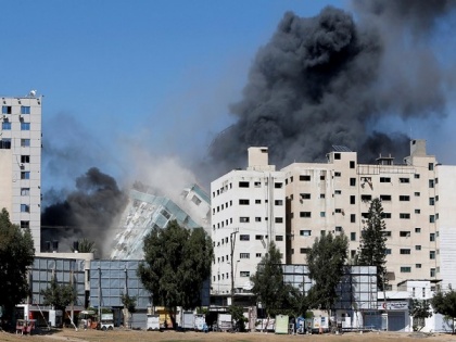 Israel destroys Gaza tower housing international media offices | Israel destroys Gaza tower housing international media offices