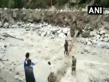Himachal Pradesh: Police rescue locals from Kharogla Nalla during flash floods | Himachal Pradesh: Police rescue locals from Kharogla Nalla during flash floods