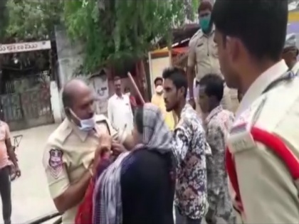 Woman attacks on duty policeman in Hyderabad | Woman attacks on duty policeman in Hyderabad