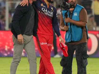 Tears, triumph & tight hugs: Kohli embraces Anushka, ABD, Gayle after RCB's maiden IPL win | Tears, triumph & tight hugs: Kohli embraces Anushka, ABD, Gayle after RCB's maiden IPL win