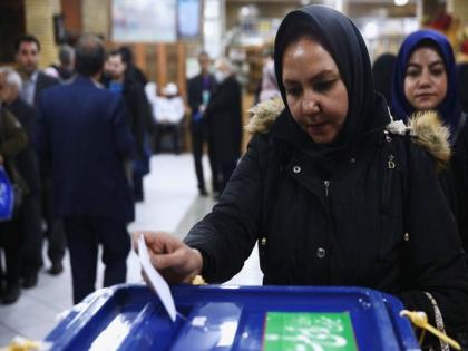 Irans head to polls to pick new parliament | Irans head to polls to pick new parliament Irans head to polls to pick new parliament | Irans head to polls to pick new parliament
