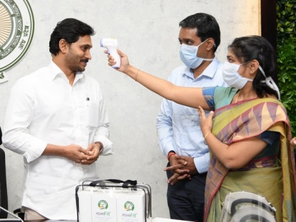 Andhra CM launches infrared non-contact forehead thermometer, proactive face masks | Andhra CM launches infrared non-contact forehead thermometer, proactive face masks