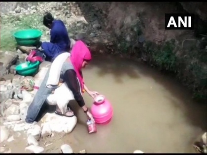 Villagers forced to use contaminated water from nullah in J-K's Kathua | Villagers forced to use contaminated water from nullah in J-K's Kathua