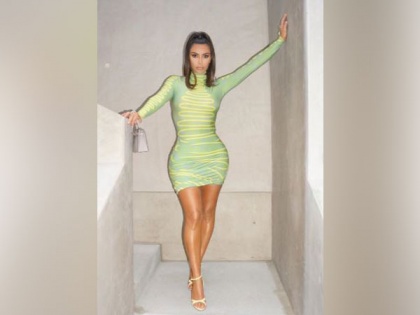 Kim Kardashian pulled her gold bodysuit during her White House visit | Kim Kardashian pulled her gold bodysuit during her White House visit