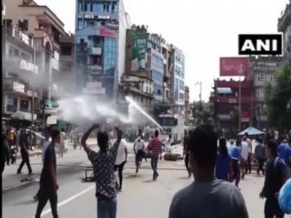 Nepal: Protesters defy COVID-19 lockdown orders, clash with police over chariot procession | Nepal: Protesters defy COVID-19 lockdown orders, clash with police over chariot procession