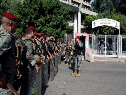 Lebanese army vows to open fire at any armed person in Beirut after attack on protesters | Lebanese army vows to open fire at any armed person in Beirut after attack on protesters