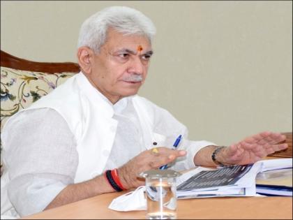 J-K Lt Governor directs officials for district-level campaigns to mitigate COVID-19 spread | J-K Lt Governor directs officials for district-level campaigns to mitigate COVID-19 spread