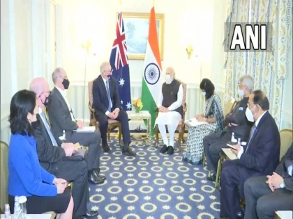 PM Modi meets his Australian counterpart Scott Morrison ahead of Quad Leaders' Summit | PM Modi meets his Australian counterpart Scott Morrison ahead of Quad Leaders' Summit