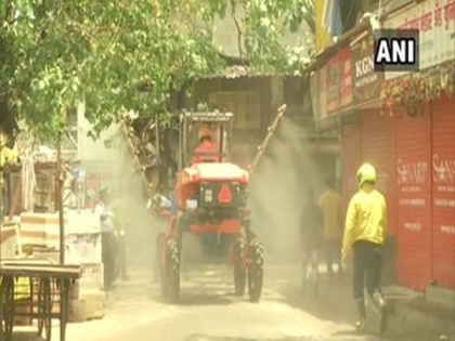 Mumbai Fire Dept uses mist blowing machine to disinfect Dharavi, amid rising COVID-19 cases | Mumbai Fire Dept uses mist blowing machine to disinfect Dharavi, amid rising COVID-19 cases