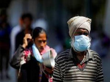 COVID-19: Hospitals in PoK get used PPE kits, masks with 'paan' stains | COVID-19: Hospitals in PoK get used PPE kits, masks with 'paan' stains