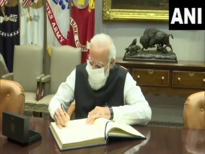 PM Modi signs visitors' book in Roosevelt Room of White House | PM Modi signs visitors' book in Roosevelt Room of White House