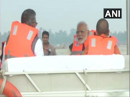 Kanpur: PM Modi takes boat ride in Ganga at Atal Ghat | Kanpur: PM Modi takes boat ride in Ganga at Atal Ghat