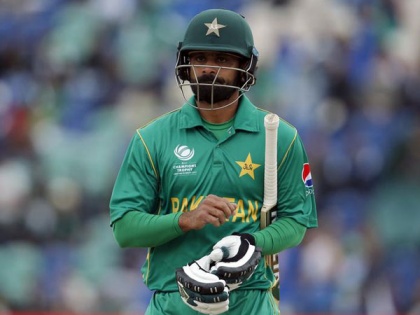 Pak all-rounder Mohammad Hafeez banned from bowling in ECB competitions for illegal bowling action | Pak all-rounder Mohammad Hafeez banned from bowling in ECB competitions for illegal bowling action