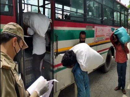 Stranded migrants sent back to their homes from shelter home in UP's Moradabad | Stranded migrants sent back to their homes from shelter home in UP's Moradabad