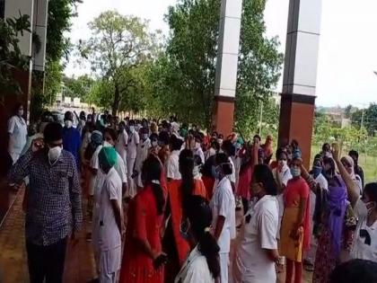 Nellore Govt Hospital nurses stage protest against suspension of 2 nurses | Nellore Govt Hospital nurses stage protest against suspension of 2 nurses