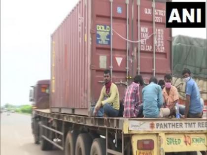 Migrant workers travel on truck to reach home | Migrant workers travel on truck to reach home Migrant workers travel on truck to reach home | Migrant workers travel on truck to reach home