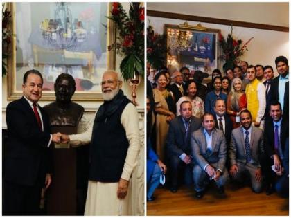 Ahead of COP-26, PM Modi meets with Indian community members, Indologists in Glasgow | Ahead of COP-26, PM Modi meets with Indian community members, Indologists in Glasgow