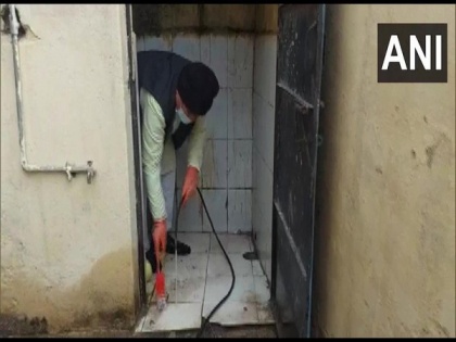 Madhya Pradesh minister cleans toilet at government school in Gwalior | Madhya Pradesh minister cleans toilet at government school in Gwalior