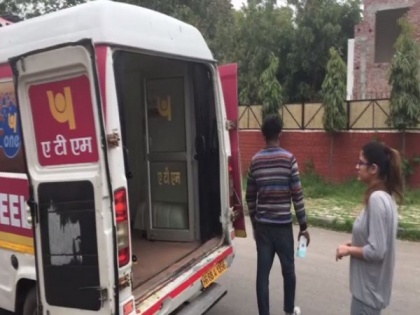 People avail door-to-door ATM service in Chandigarh | People avail door-to-door ATM service in Chandigarh